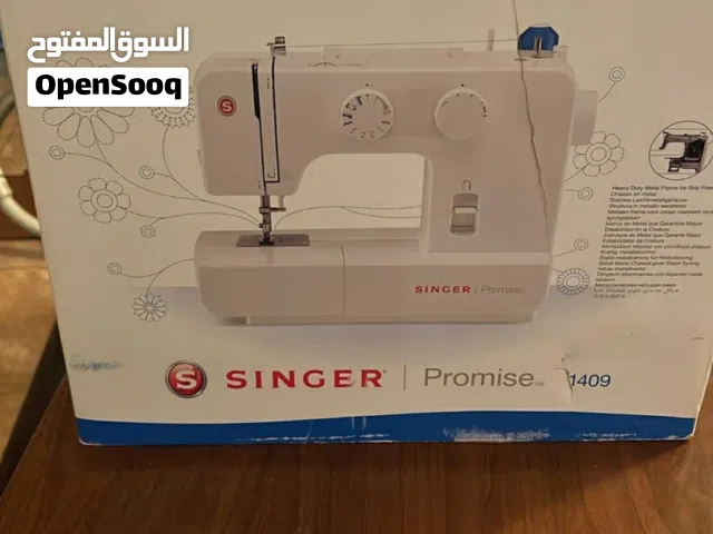 مكينة خياطة سنجر