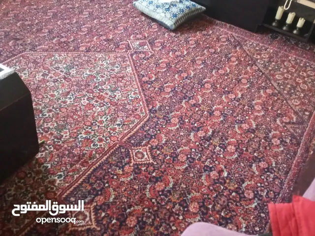 سجادة صوف ايراني بحالة جيدة