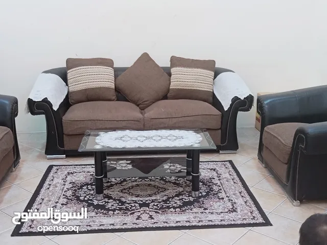 sofa set black and brown colour