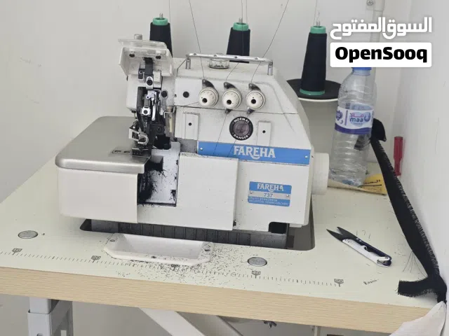 مكينه خياطه وطاوله ومكينه فينشينج وكوايه