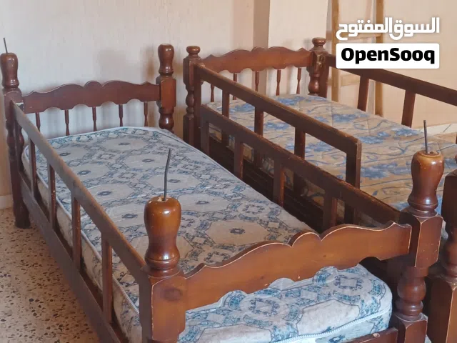 أسرة مركبه خشبيه