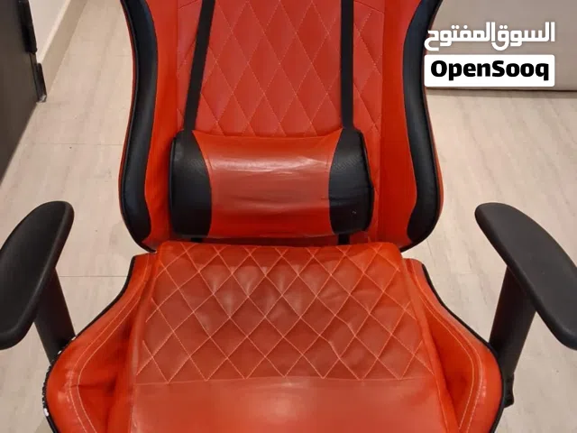 red ergonomic racing gaming chair with retractable footrest with minor scratches selling at sar150.
