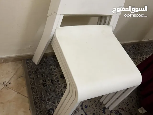 Table and chairs white IKEA along with complementary mattresses