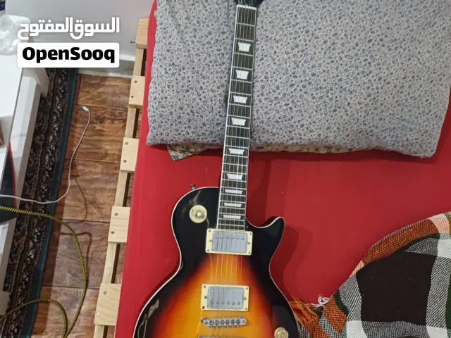 قيتار les paul مستعمل تقريبا 3 شهور اوتار اصليات من شركة Ernie Ball 2223 اكشن خورافي  بتكون لعيب فيه