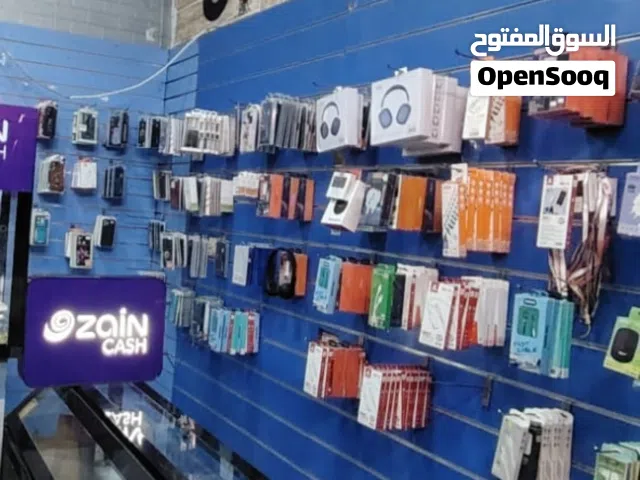 ميز ورفوف واغراض محل للبيع