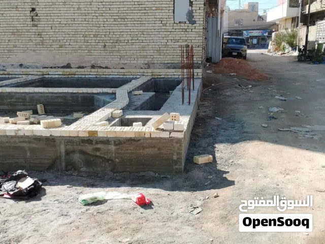 قطعة أرض 100 م2 للبيع في كربلاء - المعملجي- الحيدريات و نهاية الفرع يطل على البوبيات.