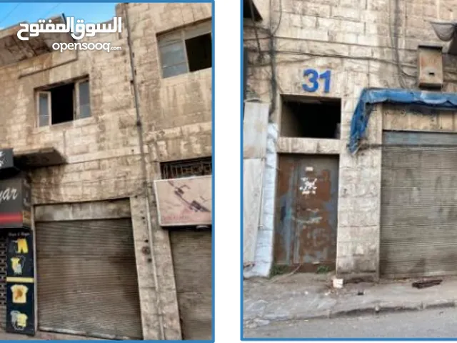 مجمع تجاري قديم 3 مخازن للبيع او الاستثمار في الشارع الطلياني قرب المستشفى