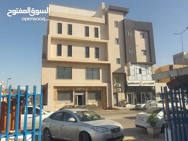 مبنى ايداري للايجار علي رئيسي النوفليين خط باب تاجوراء تشطيب حديث في موقع ممتاز يطل على 3 واجهات