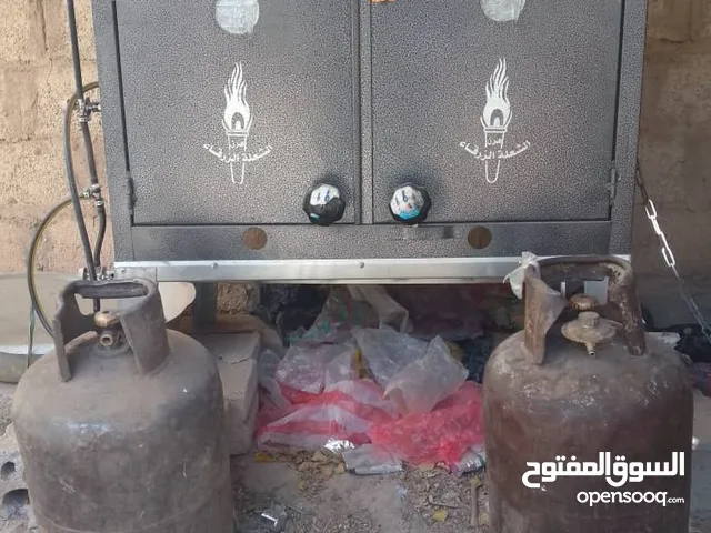 فرن طبخ مستخدم نظيف جداً شعلة زرقاء مع دبتين غاز