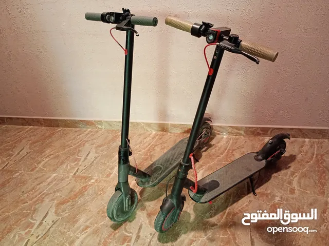 Electric scooter for sale both of them