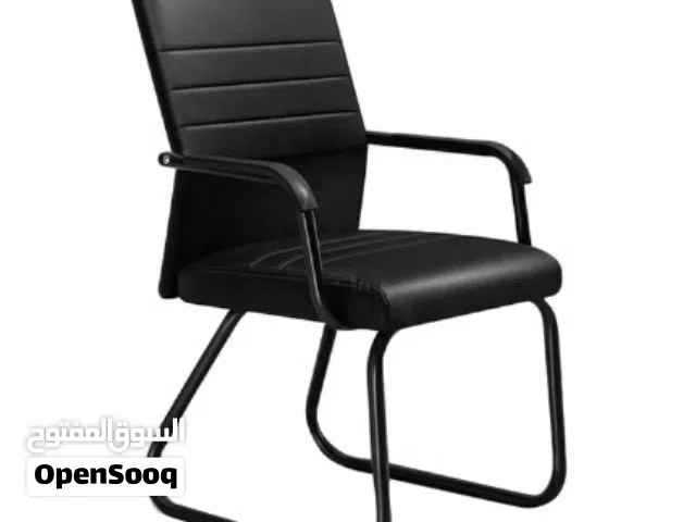 A BLACK LEATHER VISITOR CHAIR