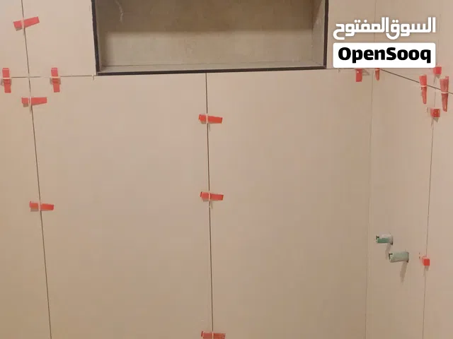 معلم مقاول بورسلان سرامیک جرانیت تکسیروترکیب حمام مطابخ فوق کاشی ترمیمات تکسیرطوفہ بناء ادوات صحی