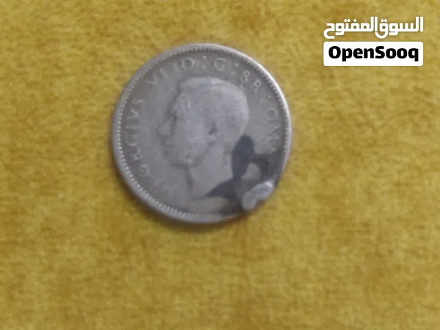 عملة معدنية بريطانية قديمة