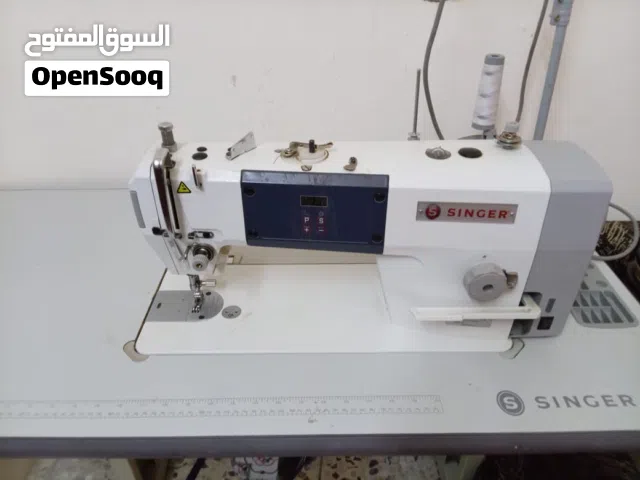 ماكنة خياطه صناعي سنجر