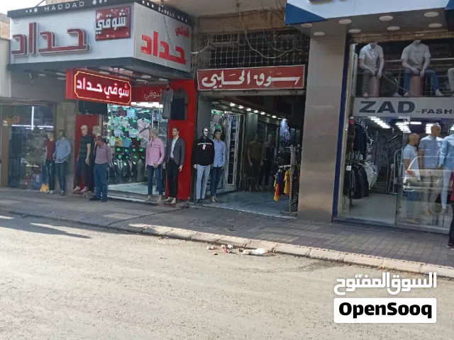 محلات داخل سوق الحلبي التجاري في اربد شارع السينما للايجار الشهري