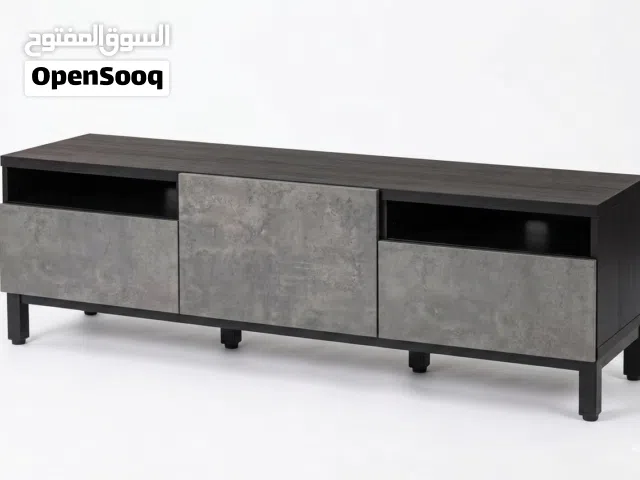 طاولة تلفزيون ikea طول cm180 استعمال خفيف و مبكتة لون اسود و سكني مع خزائن و مساحات تخزين.
