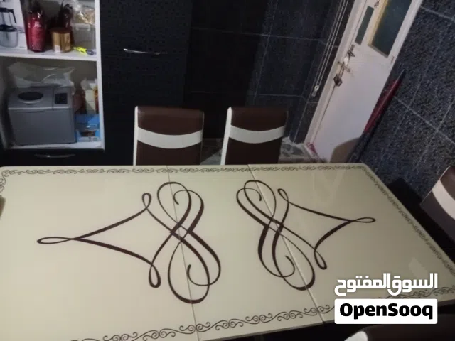 ميز طعام زجاجي