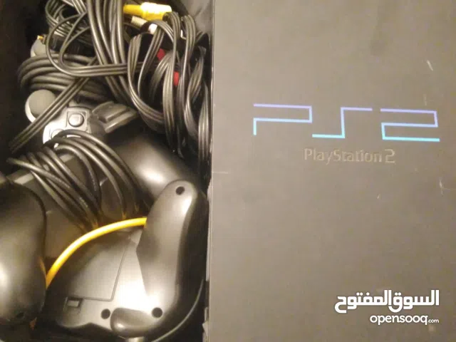 Ps2 console with wires and controllers