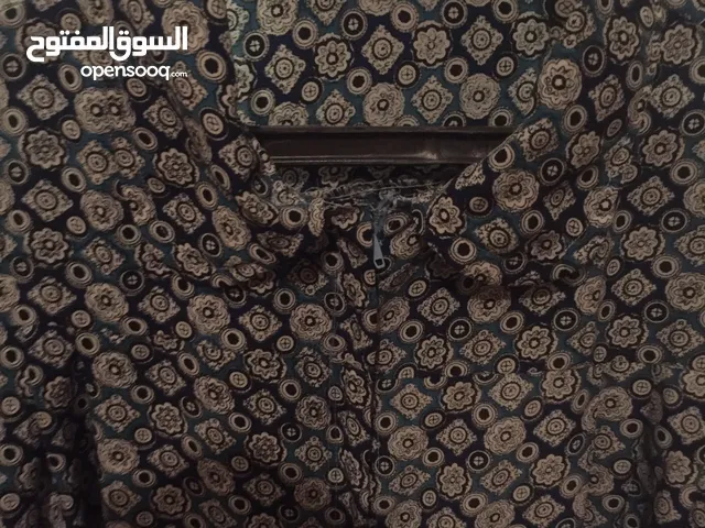 فستان تفصيل خامة ونقشة كويسة
