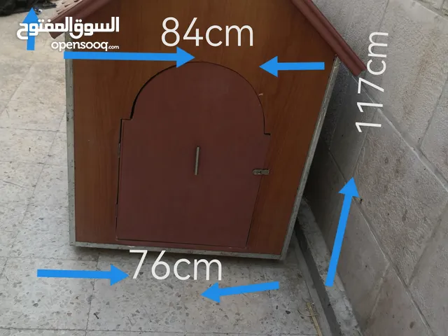 اكواخ كلاب من الخشب