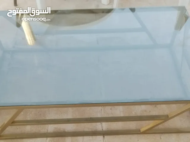 طاوله زجاجيه من تحت حديد