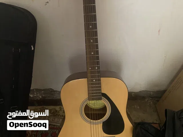 كيتار اكوستك (يماها) وكمان شرقي