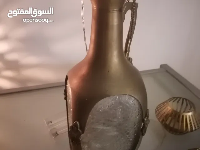 دله من نحاس والزجاج