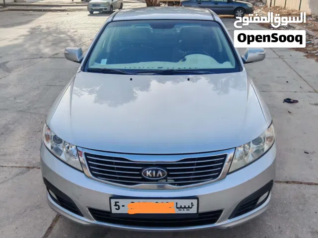 على بركة الله كيا لوتزي 2009 ماشيه 109 محرك 20اصليه كمليات فل إلا فتحه محرك كمبيو صالة تكييف قياده ا