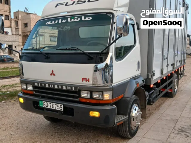 ميتسوبيشي فوسو FH موديل 2015 وارد الشركة عداد قليل 160 الف كم بحالة الوكالة مالك واحد