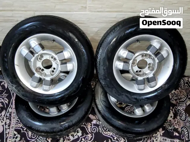 جنط وكوشوك عدد 4 بحالة جيدة مقاس 13 ( Maxxis ) محير يركب ع اغلب السيارات والكوشوك مختوم