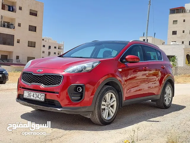 كيا سبورتاج 2016 لون خمري فل الفل بانوراما بسعر مغري قابل للبدل