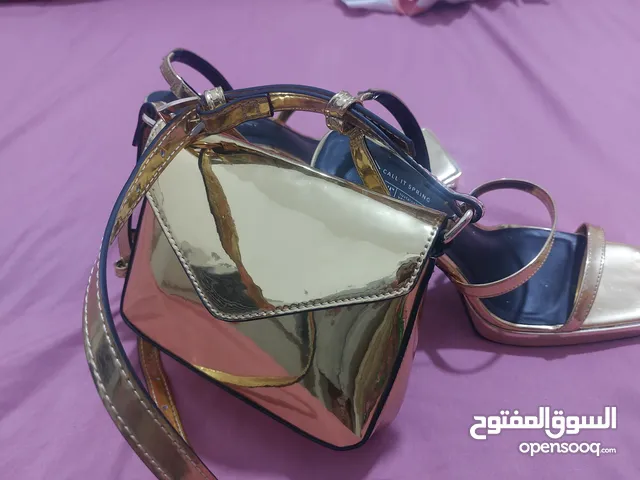 Gold With Heels in Amman