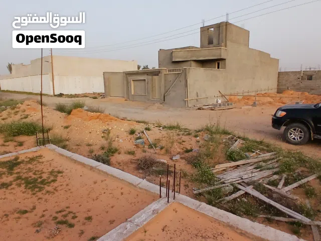 ارض في القيو 250م عليها كتينة 90م للبيع اواستبدال
