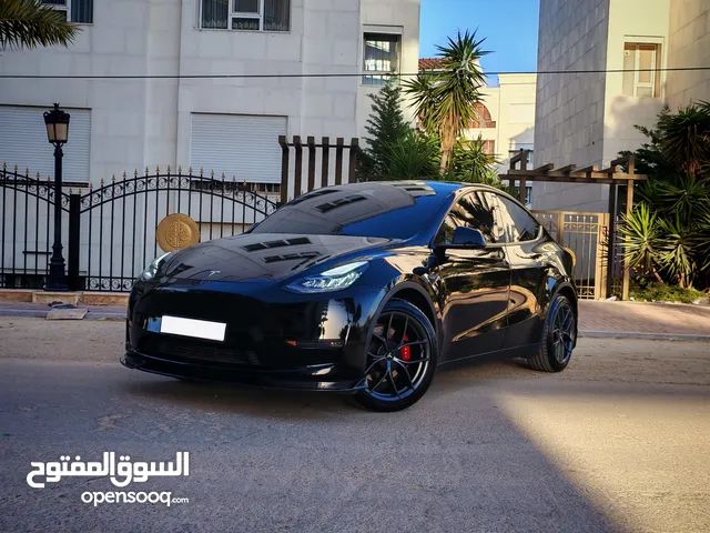 Tesla model Y 2021 standard فحص كامل ممشى 60الف كم