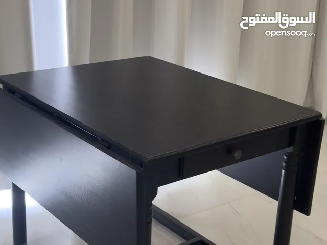طاولة سوداء خشبية قابله للطي ( السعر قابل للتفاوض) black wood folded table