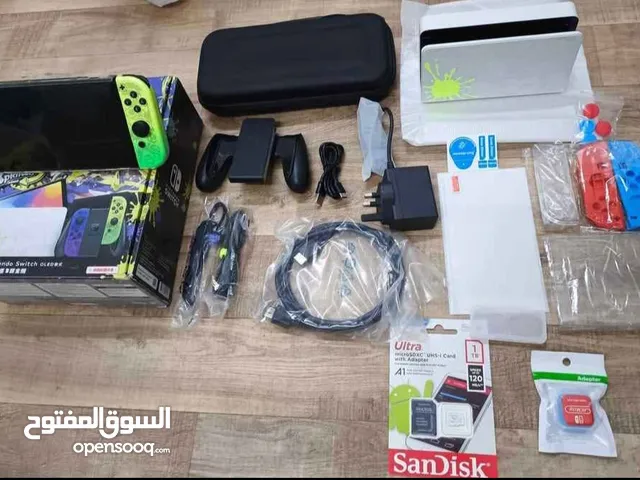 لبيع جهاز Nintendo Switch OLED المعروض في الصور مع شريط لعبة "Sniper Elite 4" الأصلي
