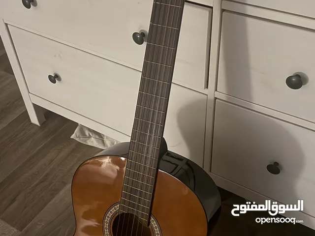 للبيع قيتار كلاسيكي جديد ماركة Suzuki