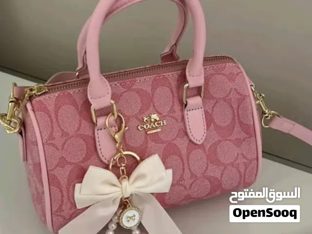 شنطه يد كوتش و شانيل