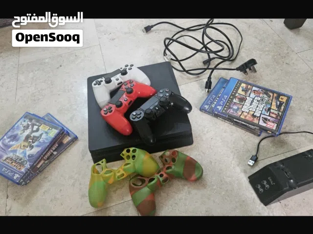 PS4 with Controllers and Discs