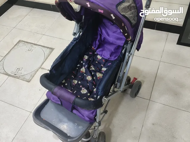 مستلزمات اطفال ... عربانه دفع جلوس ومنام ورحله للكتابه والدراسه وكرسي صغير ولعباه حجم كبير هديه