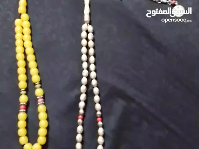 مسابح الصفراء كارب والثانية عادي