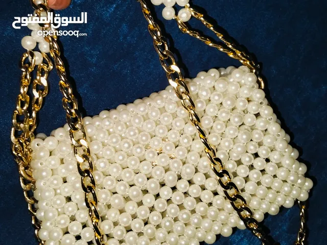 شنطه لولي ابيض