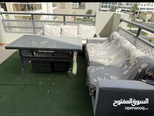 Table with 2 sofas and carpets