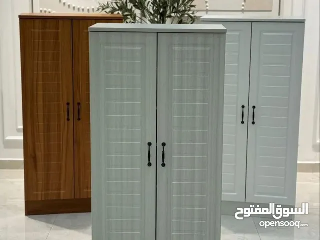 "خزانة أحذية أنيقة... تنظيم ومساحة في قطعة واحدة"