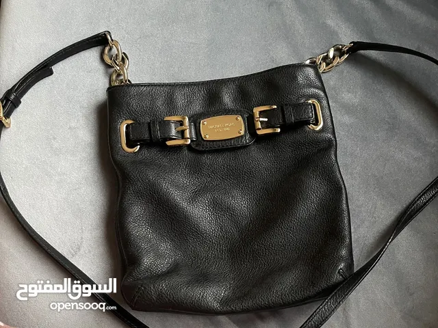 شنطه مايكل كورس كالحديده