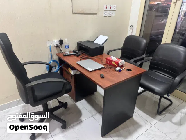 office desk with three chairs