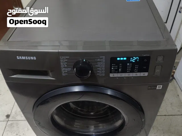 samsung latest model fully automatic washing machine in new condition very less used neat and clean