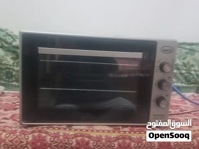 فرن غاز بمواصفات مايكرويف جديد لم يستخدم سوى مرتين اقتصادي جدا يعمل جميع الماكولات شكل راقي وسهل