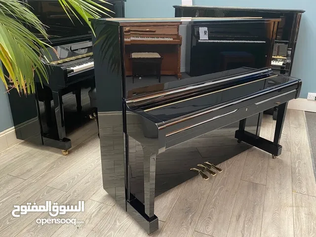Elegant Yamaha U1H Upright Piano - Perfect for Musicians!