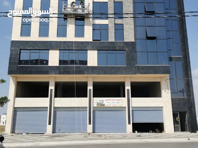 مجمع تجاري جديد في موقع مميز للإيجار مخازن وطوابق تجارية